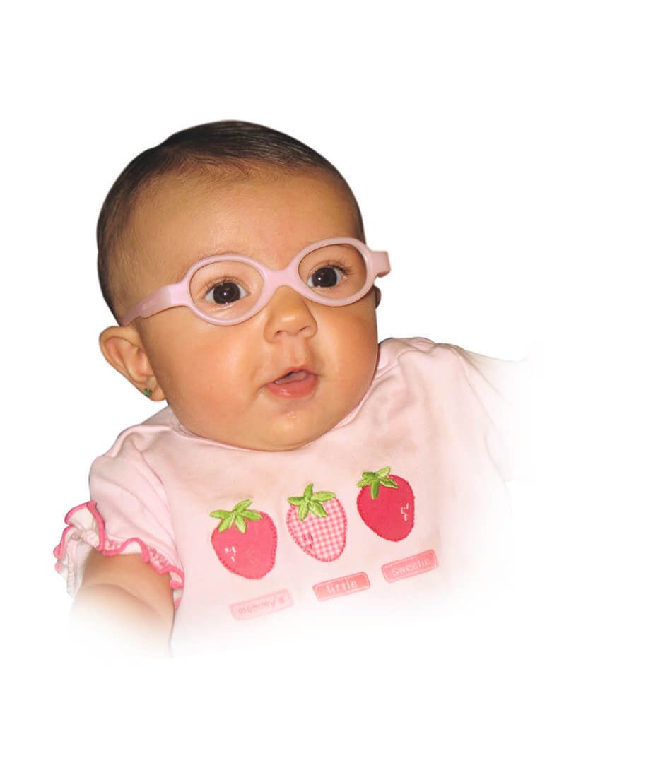 A baby wearing glasses and pink shirt.